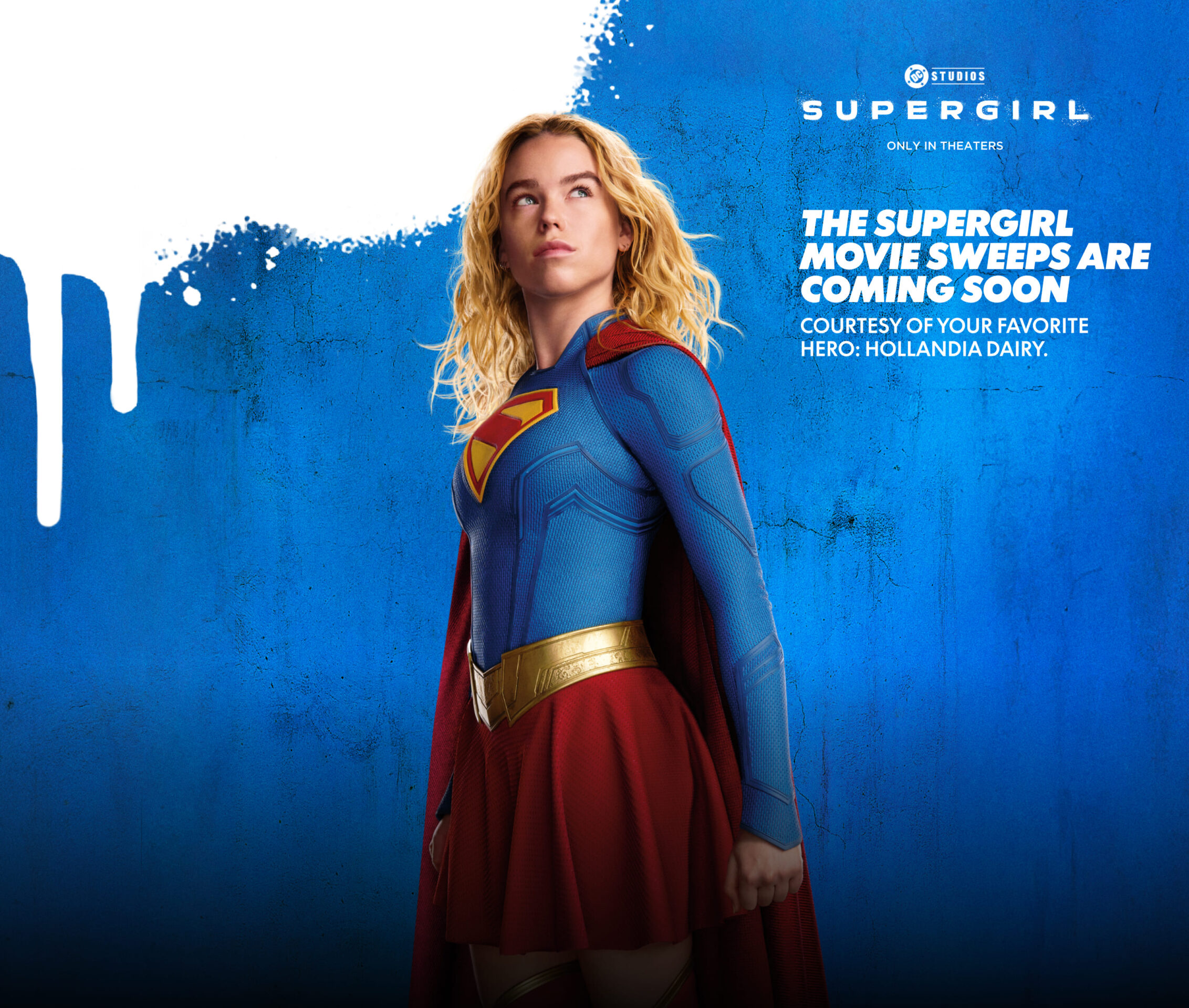 Supergirl stands confidently in a poised side profile, radiating strength and composure.